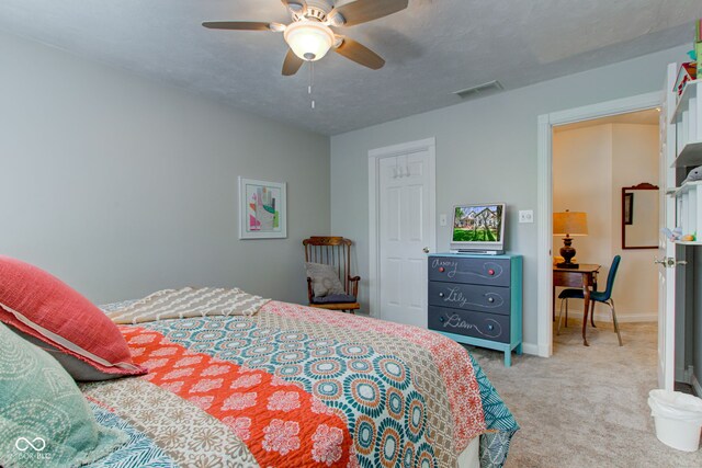 3533 Alexandria Pike, Anderson, IN 46012 - carpeted bedroom with baseboards and a ceiling fan