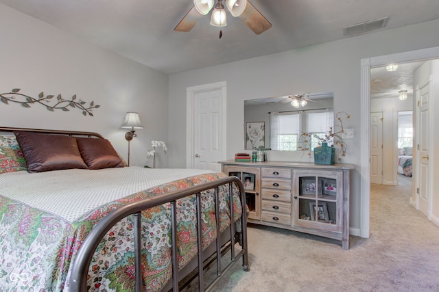 3533 Alexandria Pike, Anderson, IN 46012 - bedroom with light colored carpet, a ceiling fan, and baseboards