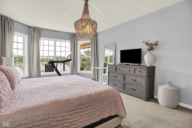 1071 Serenity Ct, Carmel, IN 46280 - bedroom featuring light carpet, a chandelier, and baseboards