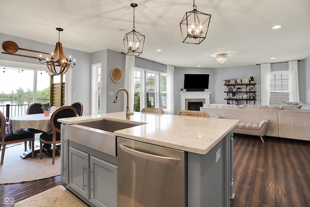 1071 Serenity Ct, Carmel, IN 46280 - kitchen with dishwasher, a chandelier, gray cabinetry, a sink, and dark wood-type flooring
