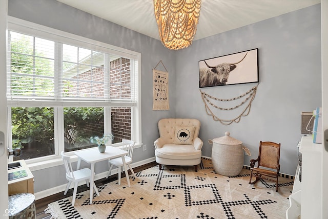 1071 Serenity Ct, Carmel, IN 46280 - sitting room featuring a chandelier and baseboards
