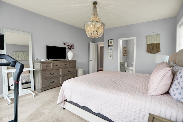 1071 Serenity Ct, Carmel, IN 46280 - carpeted bedroom featuring a chandelier and ensuite bath