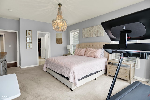 1071 Serenity Ct, Carmel, IN 46280 - carpeted bedroom featuring a chandelier and baseboards