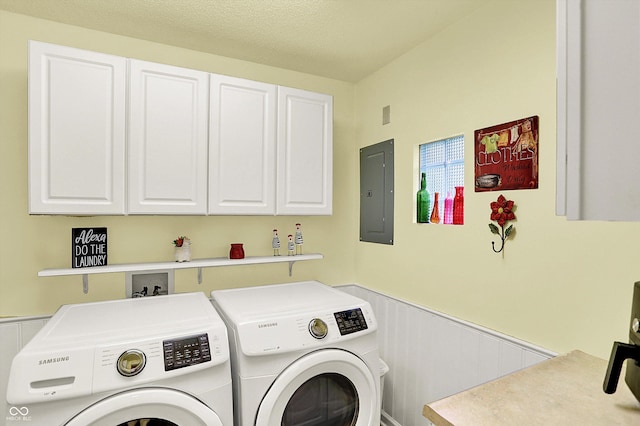 4125 S Post Rd, Indianapolis, IN 46239 - laundry area featuring electric panel, separate washer and dryer, a wainscoted wall, and cabinet space