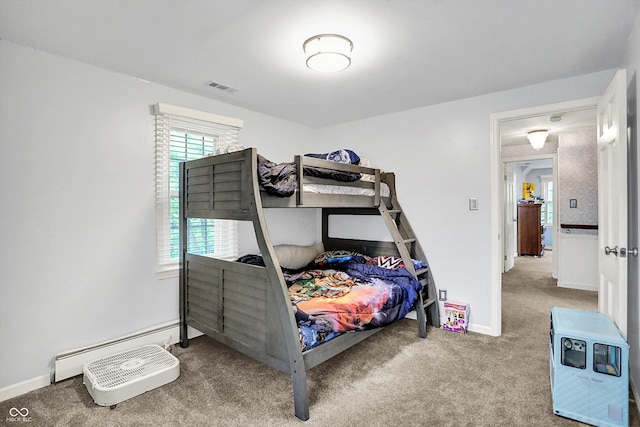 8301 E County Road 801 S, Plainfield, IN 46168 - bedroom featuring a baseboard heating unit, carpet floors, and baseboards