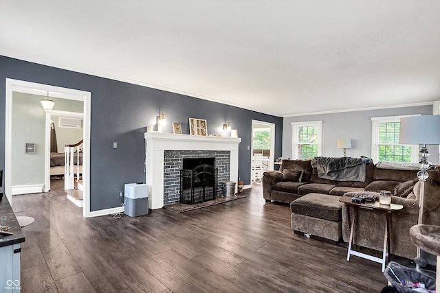 8301 E County Road 801 S, Plainfield, IN 46168 - living room with dark wood-style flooring, a tiled fireplace, baseboards, and ornamental molding