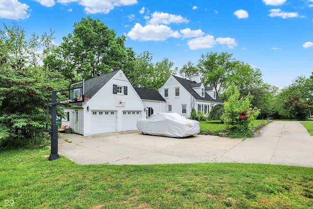8301 E County Road 801 S, Plainfield, IN 46168 - view of front of property with a front lawn, a garage, an outdoor structure, and concrete driveway