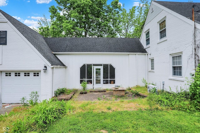 8301 E County Road 801 S, Plainfield, IN 46168 - view of side of home with a garage, board and batten siding, and a shingled roof