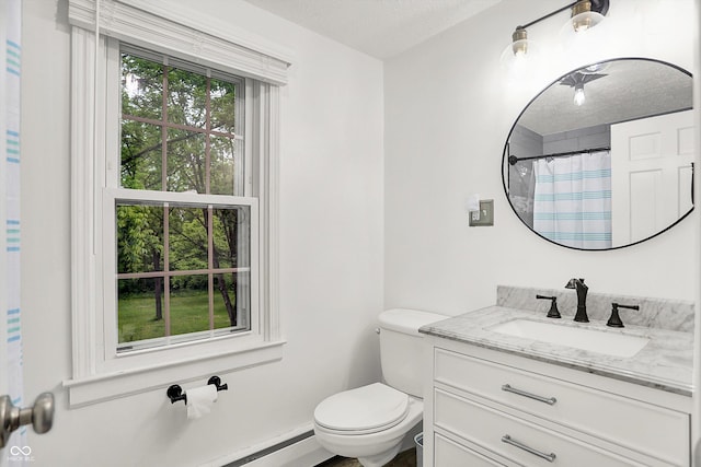8301 E County Road 801 S, Plainfield, IN 46168 - full bathroom with a textured ceiling, vanity, toilet, and curtained shower
