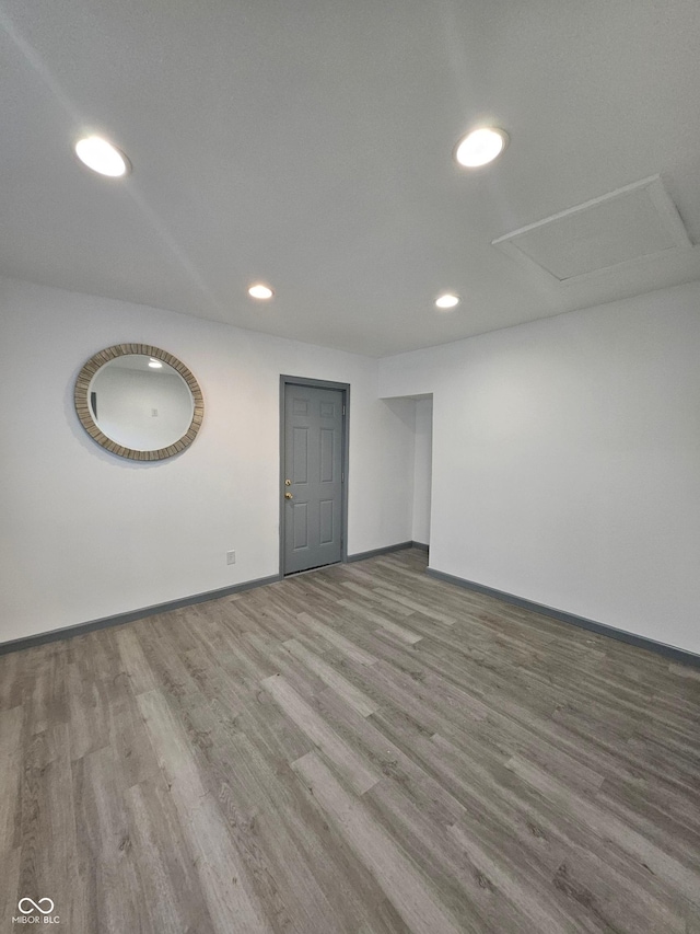 1644 Dr Andrew J Brown Ave, Indianapolis, IN 46202 - spare room featuring recessed lighting, wood finished floors, and baseboards