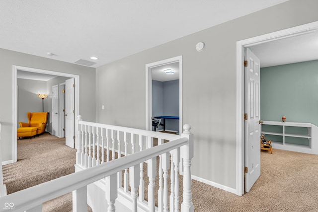 9754 Bradford Knoll Dr, Fishers, IN 46037 - hallway featuring carpet, an upstairs landing, and baseboards
