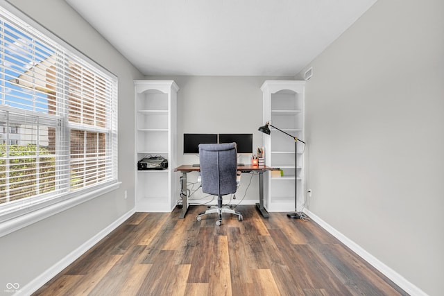 9754 Bradford Knoll Dr, Fishers, IN 46037 - home office featuring plenty of natural light, wood finished floors, and baseboards