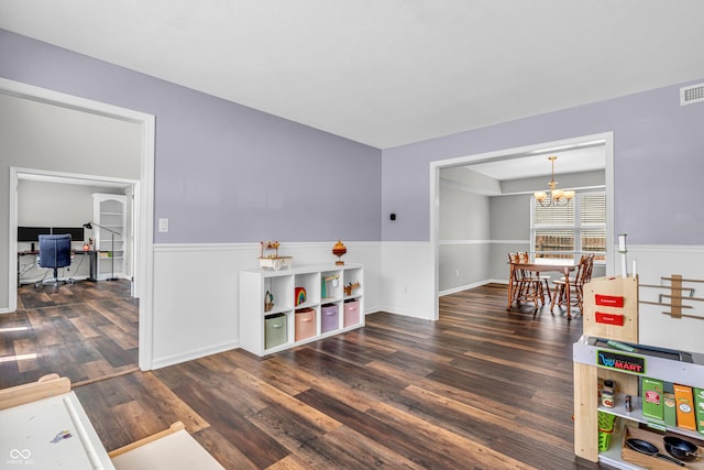 9754 Bradford Knoll Dr, Fishers, IN 46037 - rec room featuring wood finished floors, an office area, a chandelier, and wainscoting
