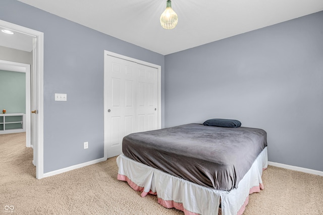 9754 Bradford Knoll Dr, Fishers, IN 46037 - bedroom featuring carpet flooring, baseboards, and a closet