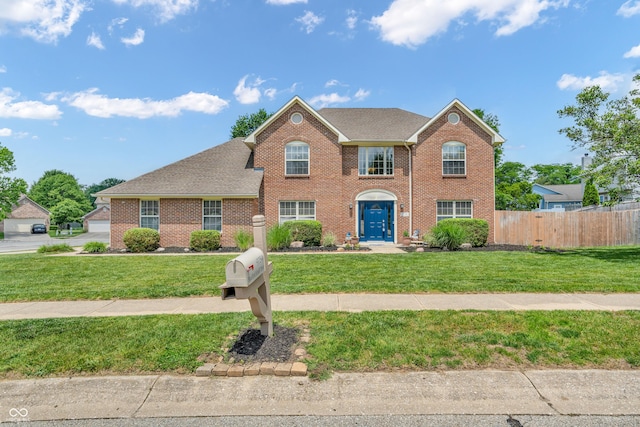 9754 Bradford Knoll Dr, Fishers, IN 46037 - colonial-style house featuring brick siding and roof with shingles