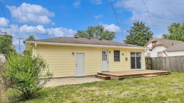 5806 E 19th St, Indianapolis, IN 46218 - rear view of house featuring a deck and roof with shingles