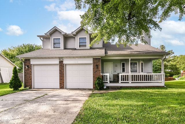 11612 E 75th St, Indianapolis, IN 46236 - view of front of home featuring covered porch, an attached garage, a front lawn, driveway, and brick siding