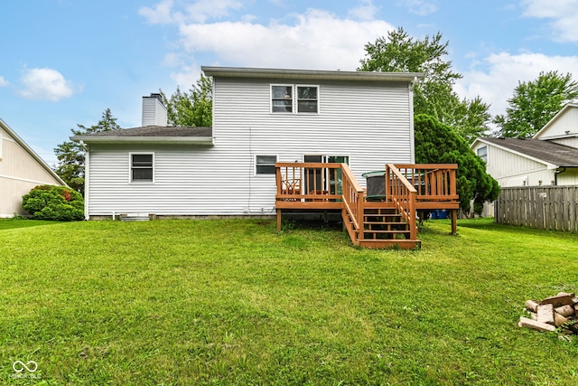 11612 E 75th St, Indianapolis, IN 46236 - rear view of house featuring a wooden deck and a chimney