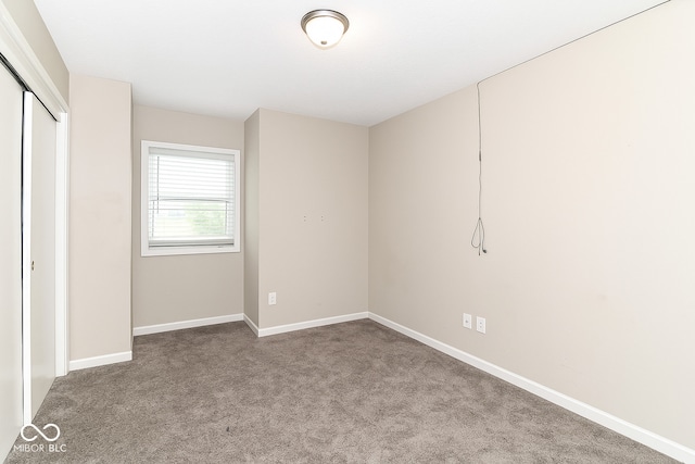 11612 E 75th St, Indianapolis, IN 46236 - unfurnished bedroom featuring carpet floors, baseboards, and a closet