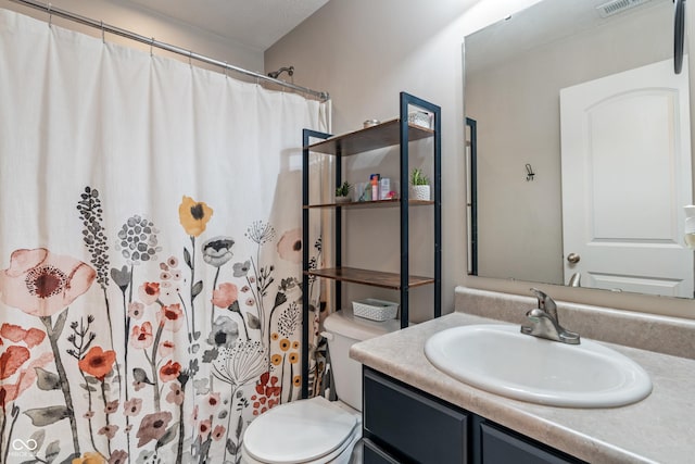 9090 Demarest Dr, Fishers, IN 46038 - bathroom with vanity, toilet, and a shower with shower curtain