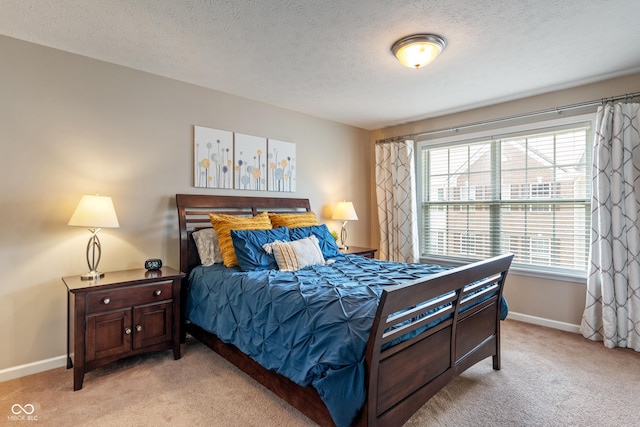 9090 Demarest Dr, Fishers, IN 46038 - bedroom featuring light carpet, baseboards, and a textured ceiling