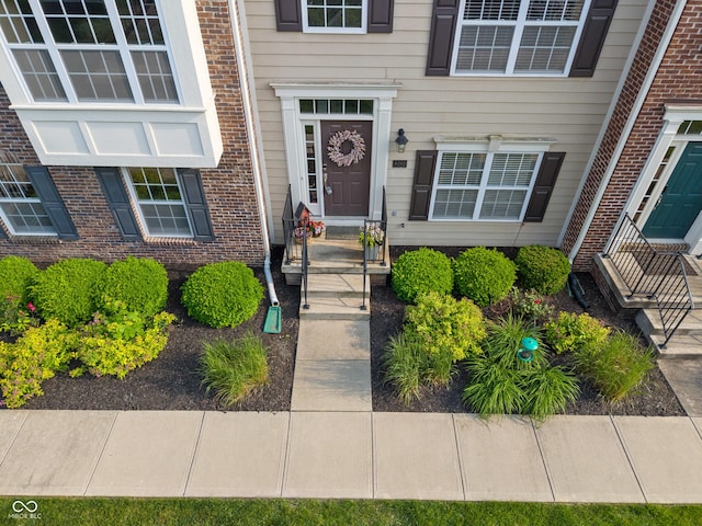 9090 Demarest Dr, Fishers, IN 46038 - doorway to property featuring brick siding
