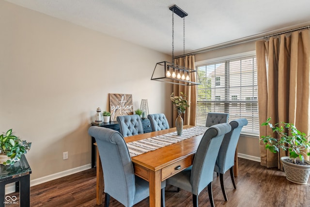 9090 Demarest Dr, Fishers, IN 46038 - dining space featuring baseboards and dark wood-style flooring