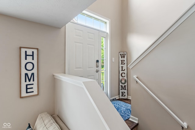 9090 Demarest Dr, Fishers, IN 46038 - foyer featuring wood finished floors and baseboards