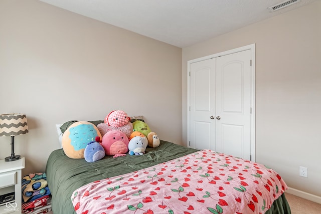 9090 Demarest Dr, Fishers, IN 46038 - bedroom with carpet, a closet, and baseboards