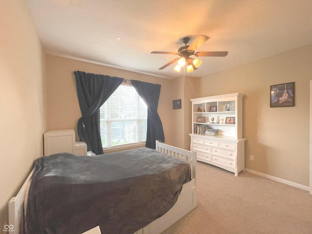 5010 Cabrillo Dr, Plainfield, IN 46168 - bedroom with light carpet, a ceiling fan, and baseboards