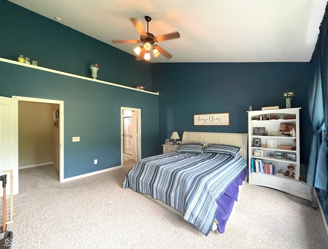 5010 Cabrillo Dr, Plainfield, IN 46168 - bedroom featuring carpet flooring, a towering ceiling, baseboards, a ceiling fan, and ensuite bathroom