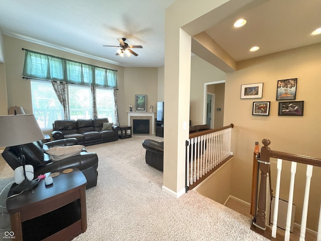 5010 Cabrillo Dr, Plainfield, IN 46168 - living room featuring carpet flooring, ceiling fan, recessed lighting, crown molding, and a fireplace