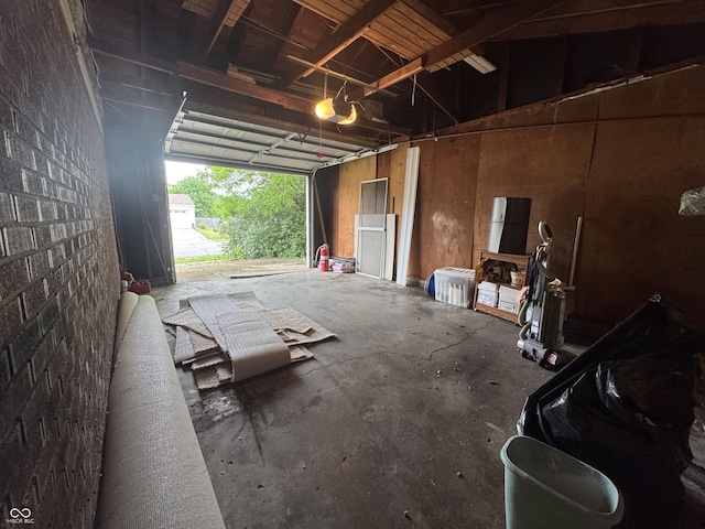 7929 Roy Rd, Indianapolis, IN 46219 - garage featuring a garage door opener