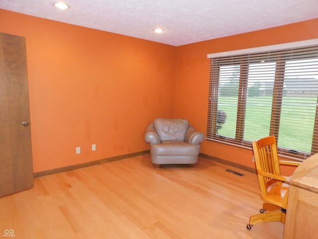 681 S County Road 150 W, Greensburg, IN 47240 - office area with wood finished floors, baseboards, a textured ceiling, and recessed lighting