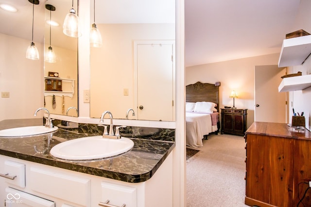 3935 Offshore Dr, Columbus, IN 47203 - bathroom featuring double vanity and ensuite bathroom
