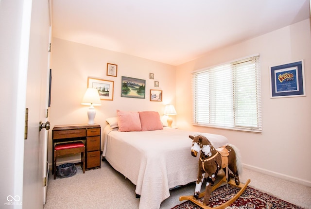 3935 Offshore Dr, Columbus, IN 47203 - bedroom with carpet flooring and baseboards