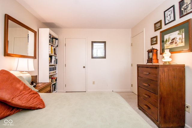 3935 Offshore Dr, Columbus, IN 47203 - bedroom featuring light carpet and baseboards