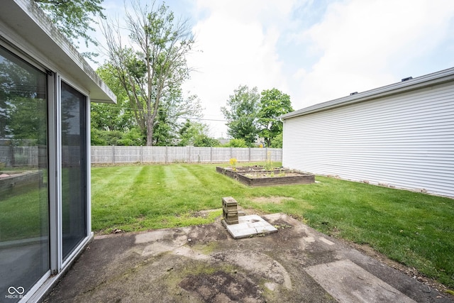 10244 Washington Blvd, Carmel, IN 46280 - view of yard featuring a garden and a patio