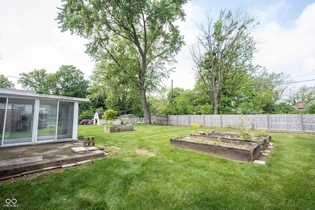 10244 Washington Blvd, Carmel, IN 46280 - view of yard featuring a vegetable garden