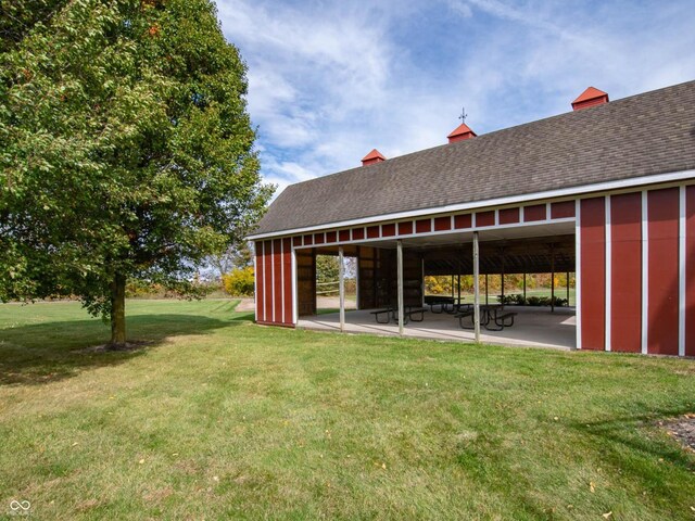 3266 W Longbranch Dr, Monrovia, IN 46157 - rear view of house with a yard and roof with shingles