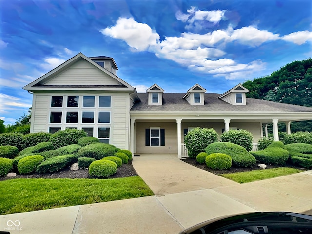 2509 Cedarmill Dr, Franklin, IN 46131 - view of front of property with driveway, a porch, and a shingled roof