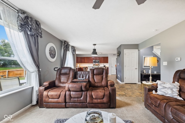 2509 Cedarmill Dr, Franklin, IN 46131 - living room with light carpet, ceiling fan, and baseboards