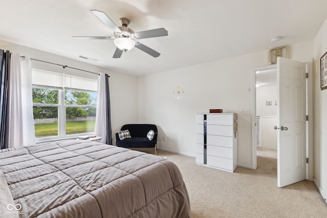2509 Cedarmill Dr, Franklin, IN 46131 - bedroom with light colored carpet, ceiling fan, and baseboards