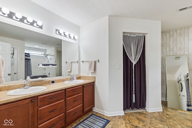 2509 Cedarmill Dr, Franklin, IN 46131 - bathroom featuring double vanity, a shower stall, and baseboards