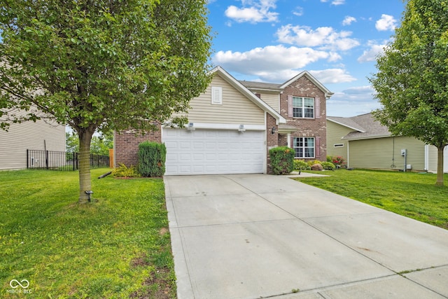 2509 Cedarmill Dr, Franklin, IN 46131 - view of front of home featuring brick siding, a garage, and driveway