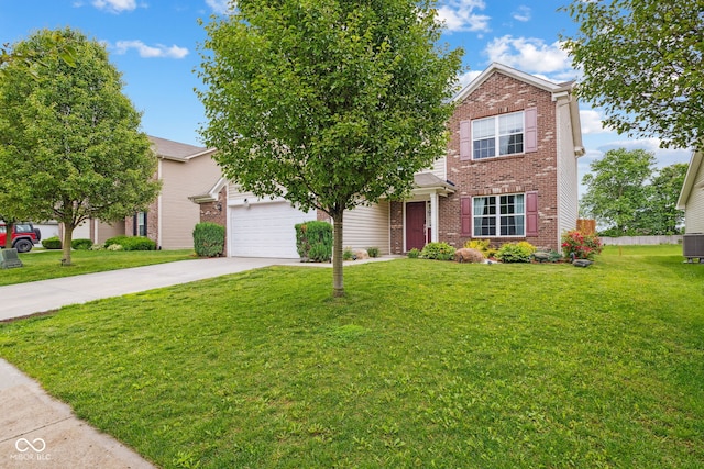 2509 Cedarmill Dr, Franklin, IN 46131 - view of front of property with brick siding, concrete driveway, a front lawn, and a garage