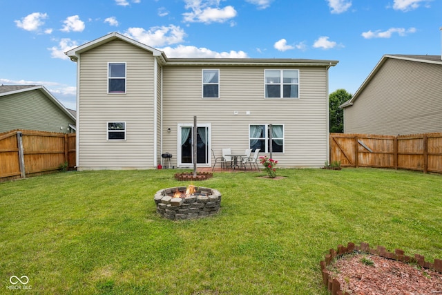 2509 Cedarmill Dr, Franklin, IN 46131 - back of house featuring an outdoor fire pit and a patio area