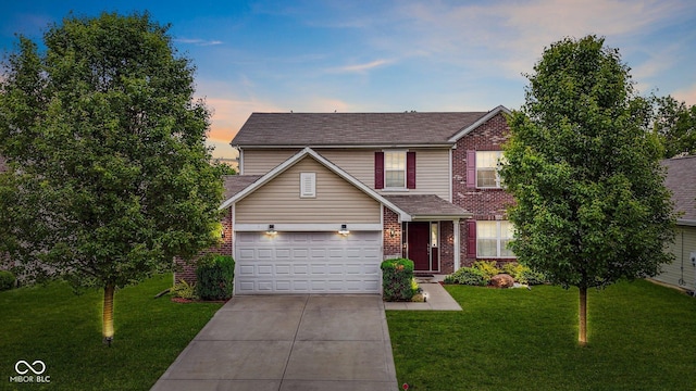 2509 Cedarmill Dr, Franklin, IN 46131 - traditional-style house with driveway, brick siding, a front yard, a garage, and a shingled roof
