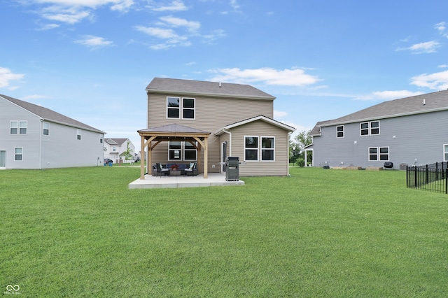 6917 Wolf Creek Ct, Whitestown, IN 46075 - rear view of property featuring a gazebo, a patio area, and a lawn
