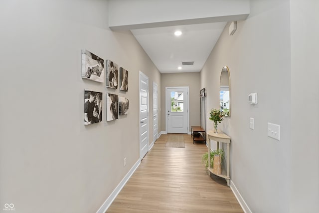 6917 Wolf Creek Ct, Whitestown, IN 46075 - entryway featuring light wood-style floors and baseboards